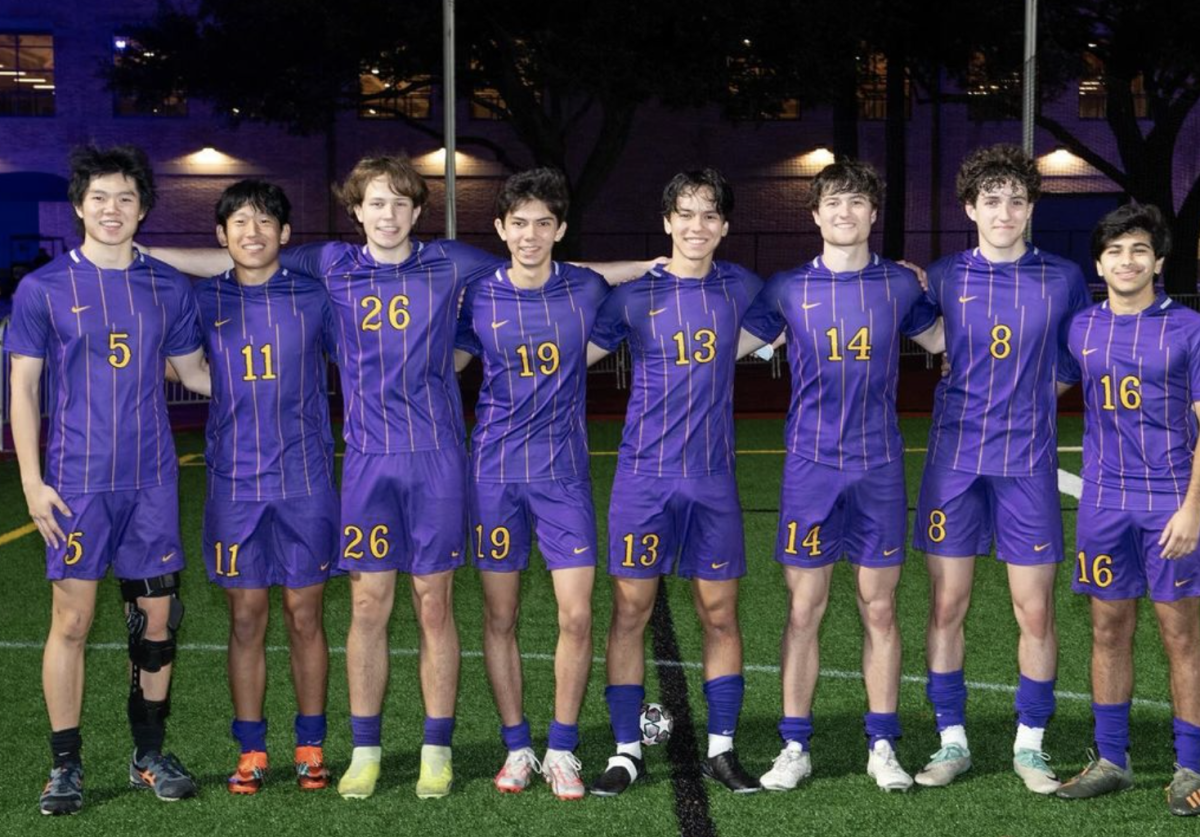 The seniors on the boys varsity soccer team pose for a group photo.